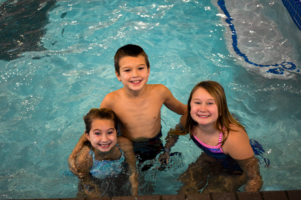 kidsposingincommunitypool001